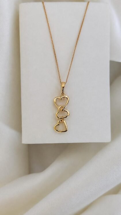 Triple-heart-gold-pendant-necklace