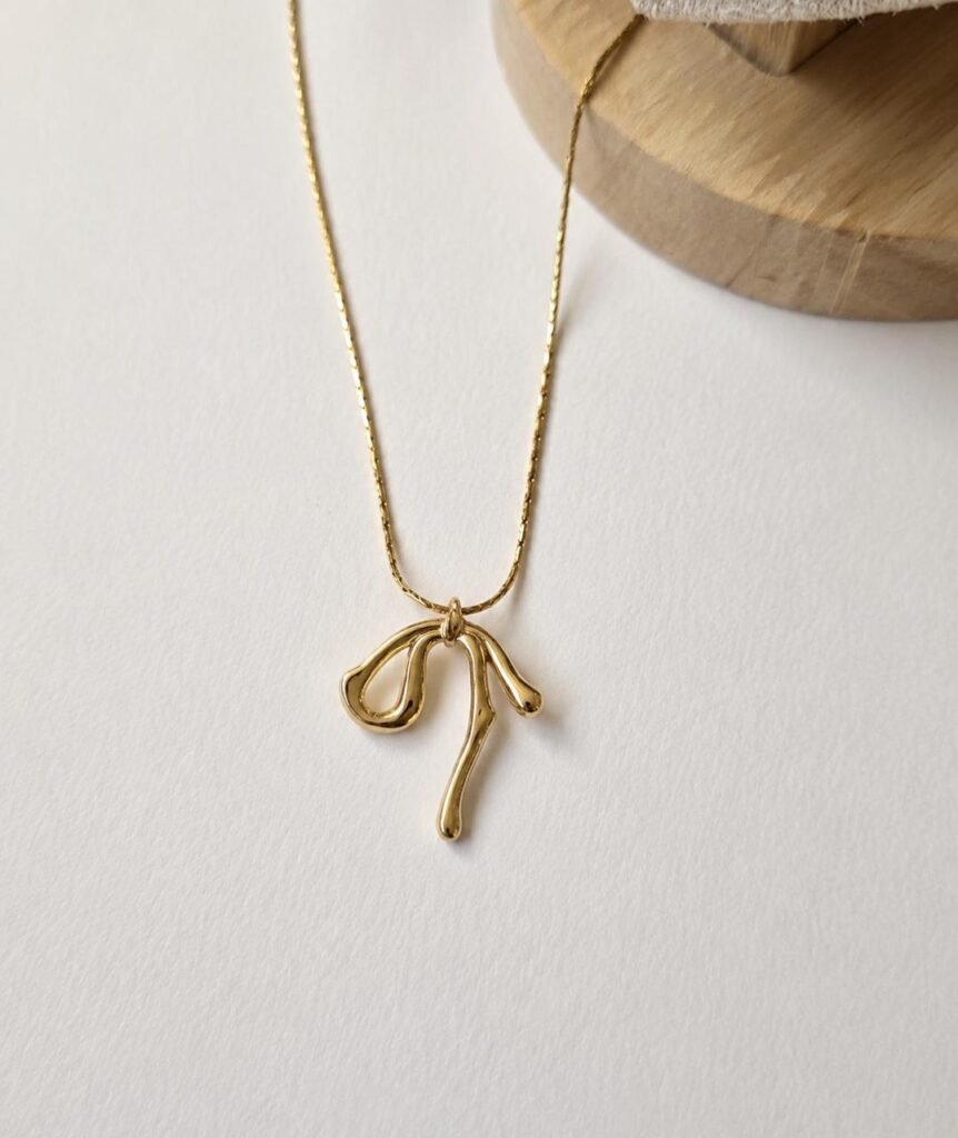 Golden Bow Pendant Necklace